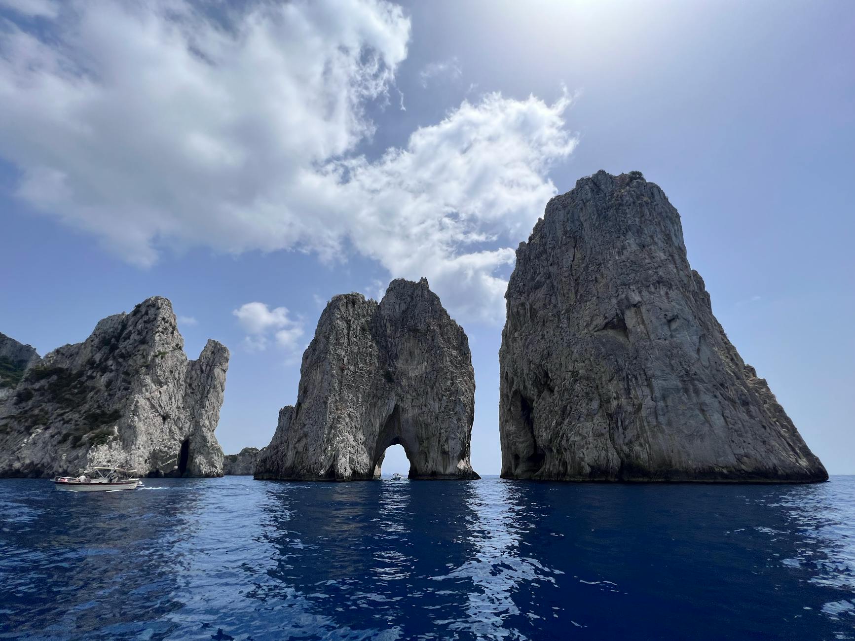 Capri Faraglioni rocks boat