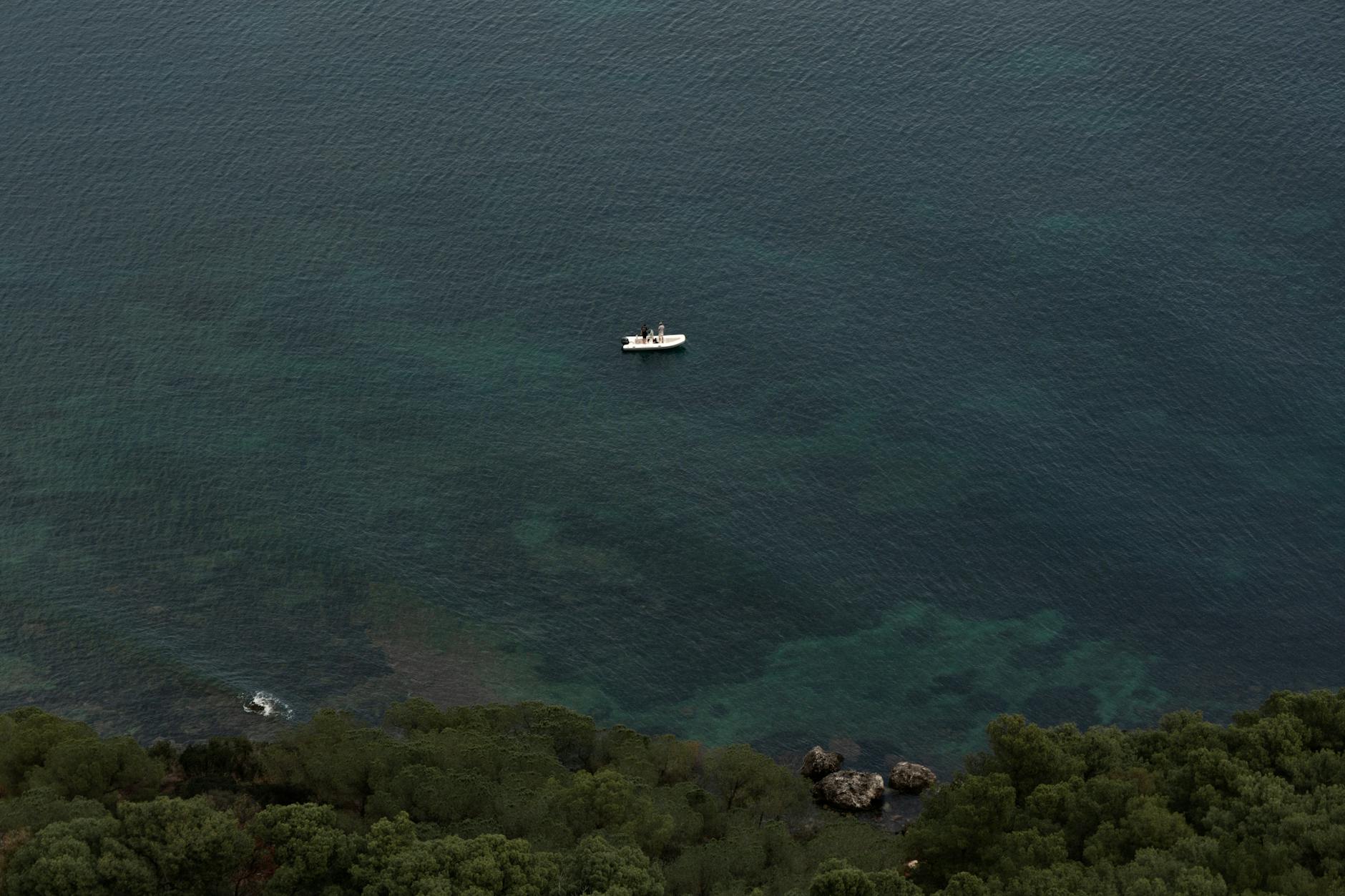 Mediterranean sea boat coastline
