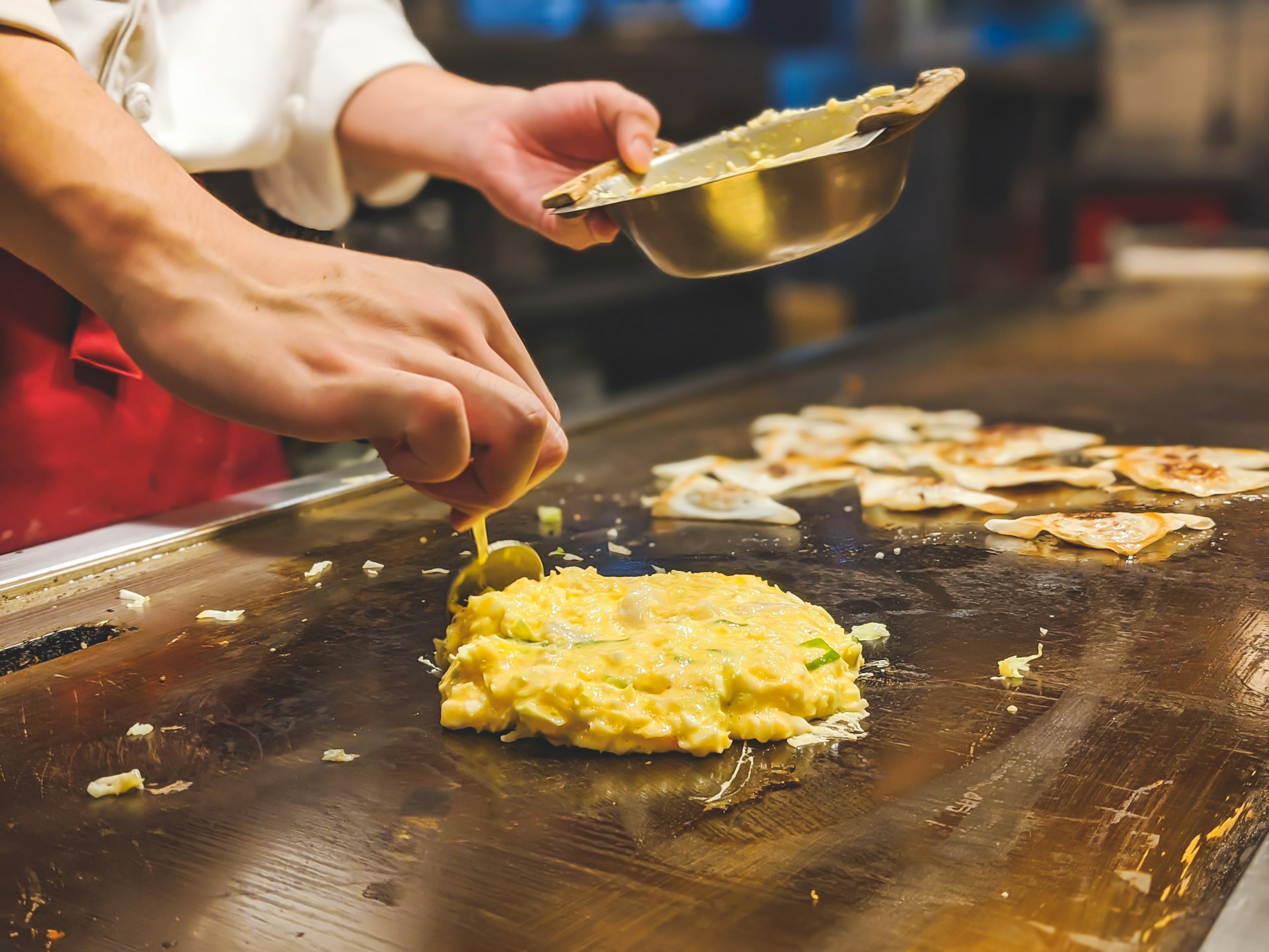 Okonomiyaki Osaka cooking on griddle
